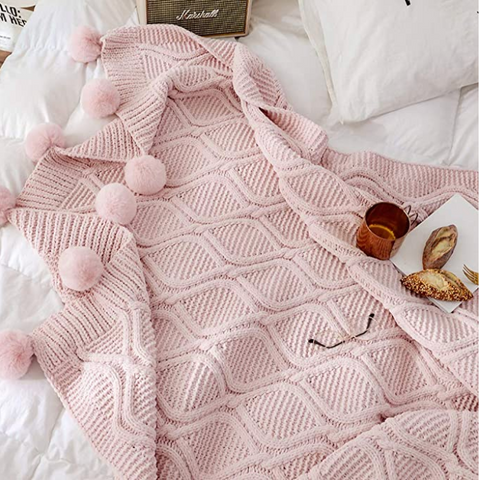 Pink blanket with pom poms hot sale
